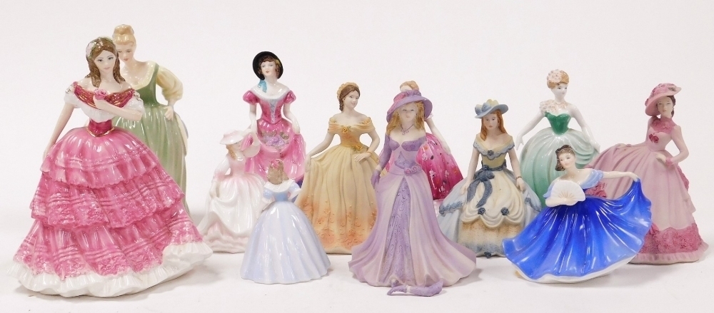 A group of porcelain figures of ladies by Coalport and Royal