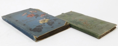 Two early 20thC postcard albums, containing postcards for Southend On Sea, Windermere, The Guildhall London, scenes from Surrey, Devon, Windsor Castle, Wimbledon Common, Crystal Palace, Thames from London Bridge, Eastbourne, etc.