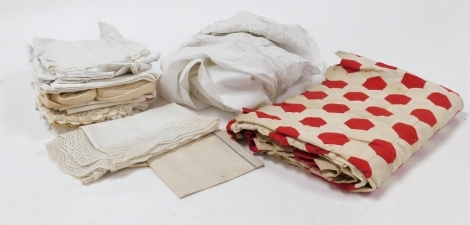 A group of early 20thC and later textiles, to include an Edwardian cotton broderie anglaise christening gown, table linen, some worked, together with a partial patchwork quilt.