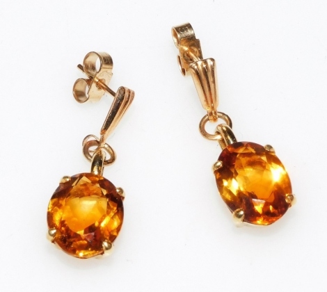 A pair of 18ct gold and citrine drop earrings, on 9ct gold wires, 3.9g.