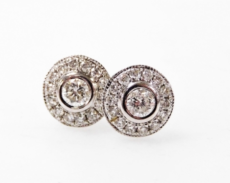 A pair of 18ct white gold and diamond stud earrings, of circular form, approx 0.38ct, 1.5g.