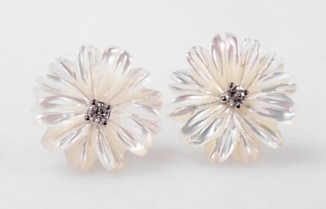 A pair of 18ct gold diamond and mother of pearl earrings, of floral form.