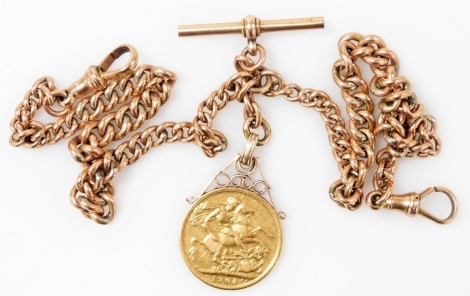 An Edward VII gold sovereign 1904, in a pendant mount, on a 9ct gold curb link Albert chain, with T bar, and two lobster claw clasps, 24.8g.