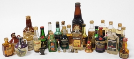 A group of alcohol miniatures, to include Bells whisky, Ardbeg whisky, Australian tawny port, Grand Marnier, etc. (1 tray)