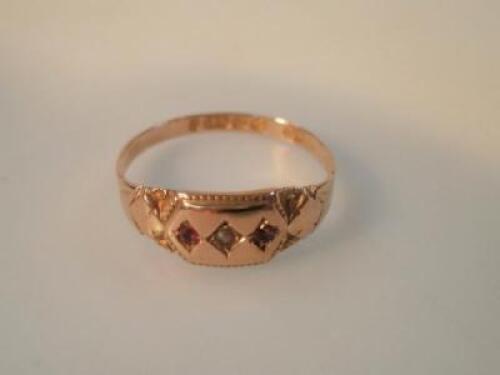 A 15ct gold ring set with seed pearl and rubies