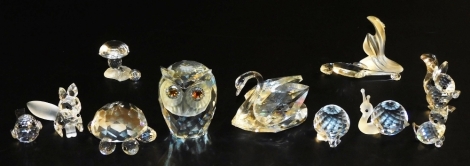 A group of Swarovski crystal and other animals, to include an owl, swan, snail, fox, etc. (some pieces AF)