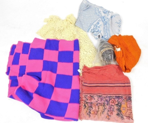 A group of crochet and knitted items, to include a yellow crochet throw, blanket squares, together with leather belts, etc. (a quantity)