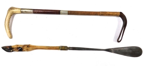 A steel and antelope's foot shoehorn, 53cm wide, together with a leather riding crop with horn handle, 62cm wide. (2)