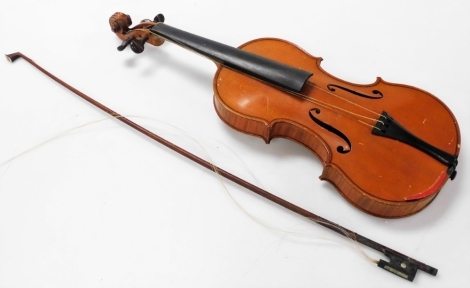 A violin, with a two piece back, bearing label marked Ch. JB Collin Mezin, Luthier a Paris, together with a violin bow, possibly indistinctly stamped Dodd. (2)