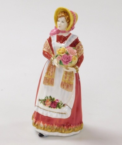 A Royal Doulton figure modelled as Old Country Roses, HN3692.