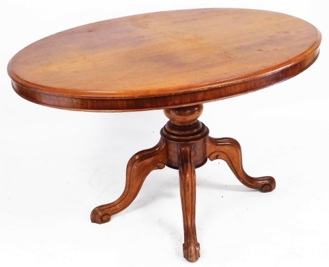 A Victorian mahogany tilt top breakfast table, the oval top raised on a baluster turned column over four cabriole legs, 71cm high, 120cm wide, 88cm deep.