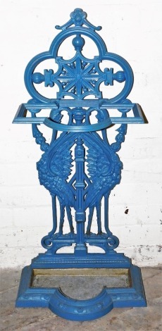 A Victorian Coalbrookdale style blue painted cast iron umbrella stand, with shaped recess, the back decorated with birds, etc., on a bow fronted base, with drip pan, 97cm high.