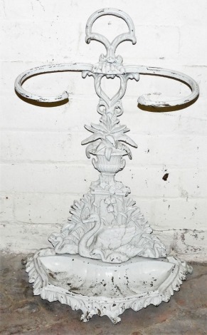 A Victorian Coalbrookdale style cast iron umbrella stand, with handle, the support decorated with a swan, urn of flowers, etc., on a gadrooned shaped base, 70cm high.