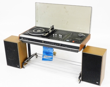 A vintage ITT stereogram, model 2030, with a pair of model LS30 speakers.