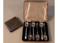 A set of six silver golf trophy coffee spoons