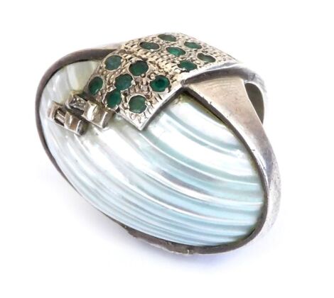 A designer silver blister pearl and emerald set ring, in an oval setting, with abstract overlay, size O.