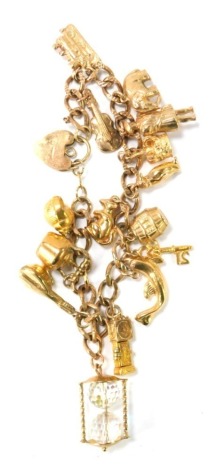 A 9ct gold charm bracelet, with heart shaped padlock, on a curb link chain, with a collection of charms, mainly stamped 375, comprising violin, train, elephant, gentleman in evening coat, crown, penguin, mouse, barrel, dolphin, 21 key, longcase clock, cry