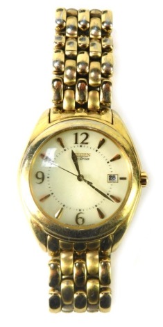 A Citizen gentleman's wristwatch, with gold coloured strap, in case.