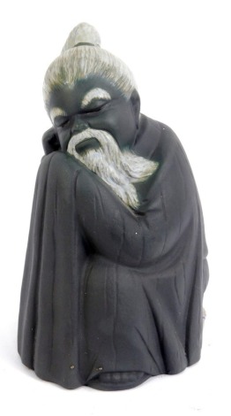 A Lladro matt black glazed figure of a Chinese monk, printed mark to underside, 16cm high.