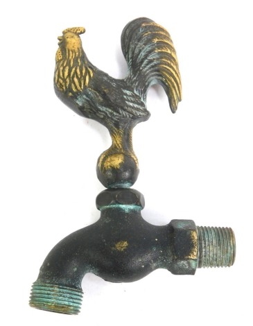 A bronze effect brass tap decorated with a cockerel stamped Flora Fauna, registered mark, 17cm high, the tap 10cm deep overall.