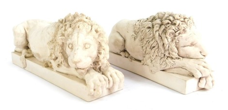 A pair of resin Rinaldo Rinaldi's sleeping lions, after Canova, from The Chatsworth Collection Made by The Revival Art Company, 22cm long.