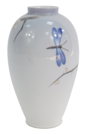 A Royal Copenhagen porcelain vase, decorated with a butterfly and prunus blossom, on a shaded blue and white ground, printed mark to underside in green, stylised wave mark S & SG, pattern no 2301 in green, 14cm high.