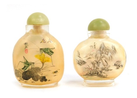 Two similar 20thC Chinese inside painted glass snuff bottles, 6.5cm and 7cm high respectively. (2)