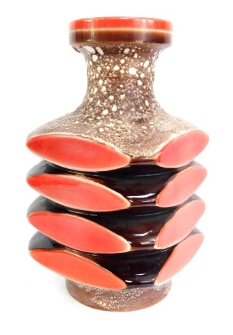 A mid century West German vase, of four ribbed oval design, on red and brown mottled ground, 40cm high.