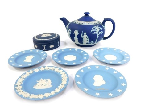 A group of Wedgwood blue Jasperware, comprising dark blue trinket box and teapot, and five Wedgwood light blue pin dishes.