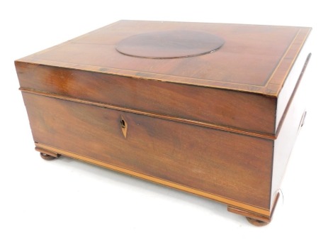 A Georgian mahogany jewellery box, with rosewood cross banding, boxwood and ebony line inlay, with a sectional interior, with blue material lining, on bun feet, 15cm high, 32cm wide, 23cm deep. (AF)