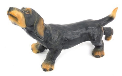 A Goebel pottery figure of a Dachshund, 28cm wide.