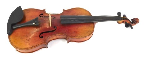 A two piece back violin, bears label for Jan Podesva, houslar, v Brne, 59cm long.