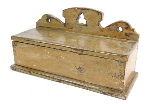 A Victorian painted church candles box, with a carved trefoil back, 22cm high, 34cm wide, 14cm deep.