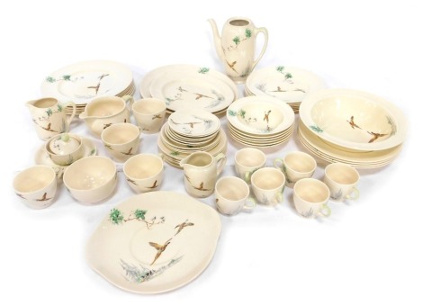 A Royal Doulton Coppice pattern part dinner, tea and coffee service, comprising coffee pot, four breakfast cups, six breakfast cup saucers, six coffee cans, six coffee can saucers, six side plates, six bowls, six medium plates, six dinner plates, oval se