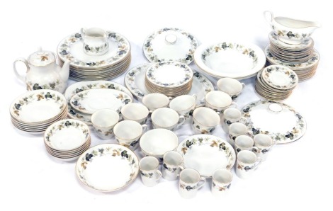 A Royal Doulton Larchmont pattern porcelain part tea and dinner service, comprising teapot, cake plate, oval meat plate, two tureens and cover, nine coffee cans, gravy boat, milk jug, nine breakfast cups, ten side plates, two teacup saucers, thirteen coff