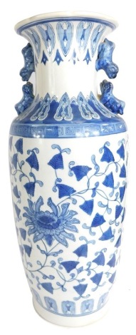 A modern Chinese blue and white porcelain vase, of shouldered, tapering form, with double dogs of fo handles, painted with flowers, unmarked, 60cm high.