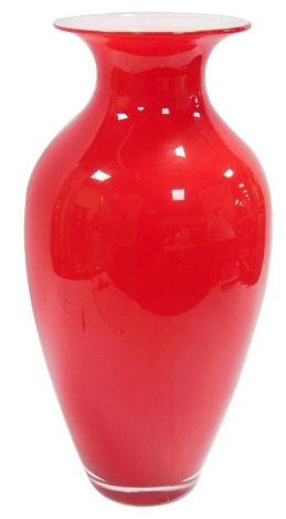 A Nason, Murano red glass vase, of shouldered, tapering from, with a white opaque interior, etched mark, 51cm high.