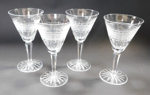 Four Waterford Rossmore pattern wine glasses.