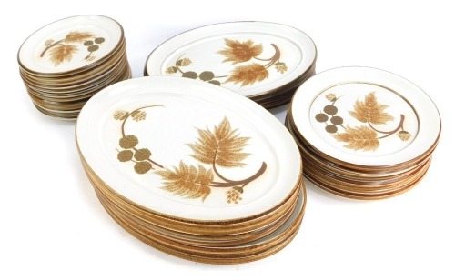 A Denby Cotswold pattern pottery part dinner service, comprising eight oval serving plates, twelve side plates, eight medium plates, and four small oval serving plates. (1 tray)