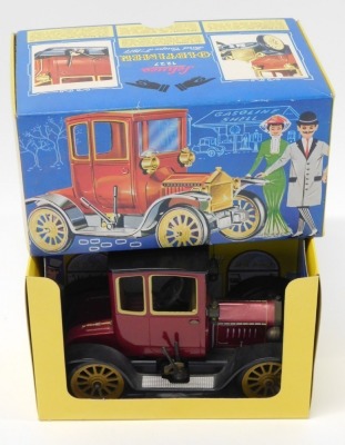 A Schuco 1227 tinplate clockwork Old Timer Ford Coupe T1917, boxed.