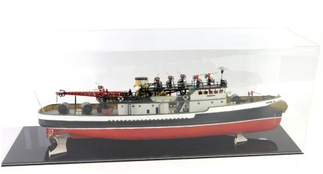 A model boat The Fire Fighter, in perspex case, 20cm high, 56cm wide, 15.5cm deep.