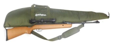 An OSMK air rifle, .22 calibre, with a Hewike sight, in canvas slip case.