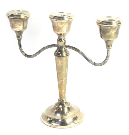 An Elizabeth II loaded silver candelabrum, Birmingham 1973, 23cm high, 15.07oz all in.