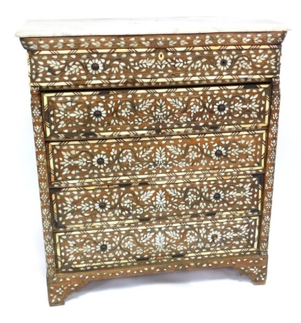 A 19thC Syrian hardwood chest, with mother of pearl and bone inlay, having a serpentine marble top over a cushion drawer, over four further long drawers, raised on bracket feet, 132cm high, 114cm wide, 54cm deep.