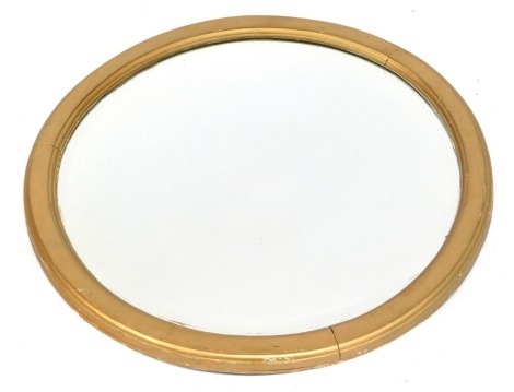 A 19thC gilt framed circular wall mirror, 52cm wide.