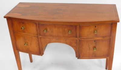 A Georgian reproduction bow front yew and burr yew sideboard, with boxwood line inlay, having a central drawer, flanked by two short over two deep drawers, raised on tapering square legs, 86cm high, 107cm wide, 45.5cm deep. - 2