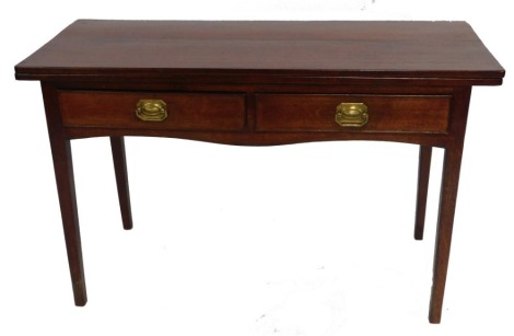 A Victorian oak side table, with a fold over top, over a pair of frieze drawers, raised on tapering square legs, 74cm high, 117cm wide, 48cm deep, 96cm extended.