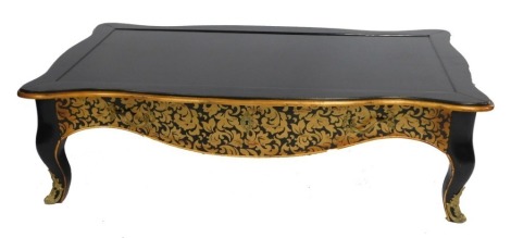 A Couleurs de Styles Louis XV style ebonised and gilt painted serpentine coffee table, with a single frieze drawer, raised on cabriole legs, brass capped, 41cm high, 139cm wide, 79cm deep.