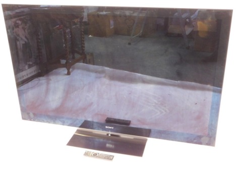 A Sony 60" flat screen colour television, model no KDL-60LX903, with lead and remote control.