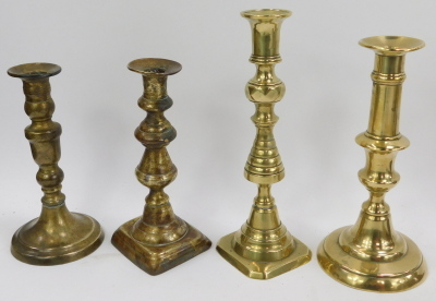 A selection of brass candlesticks, mainly singles but one pair. (a quantity) - 3